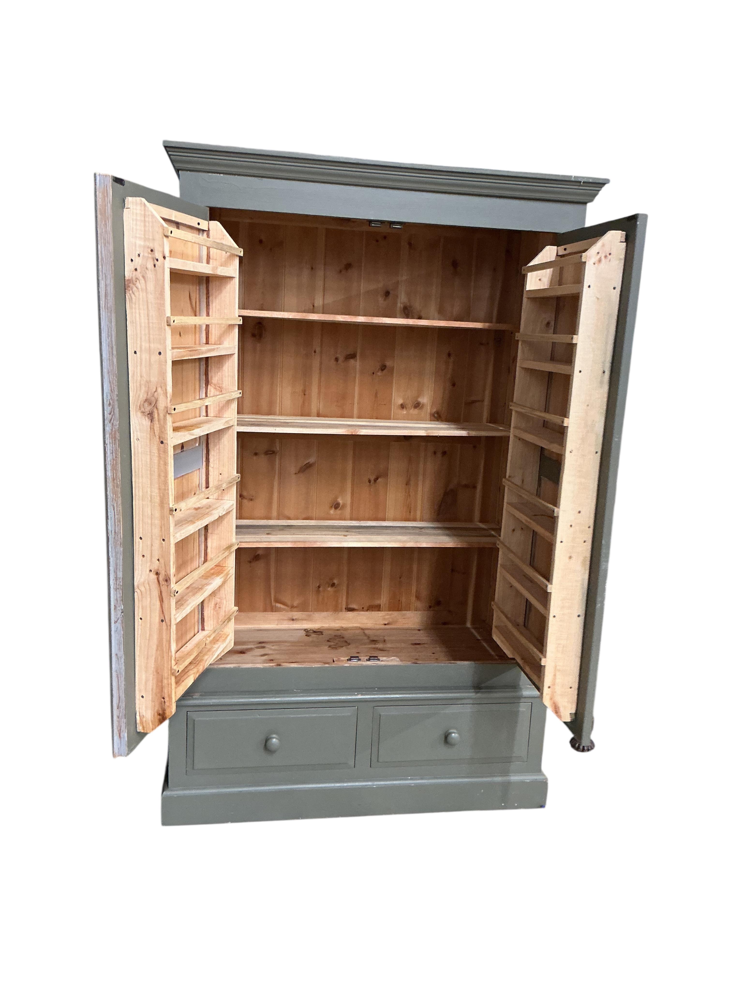 A painted pine larder cupboard, width 124cm, depth 92cm, height 200cm